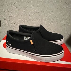 Nike Black Sneakers with White Logo
